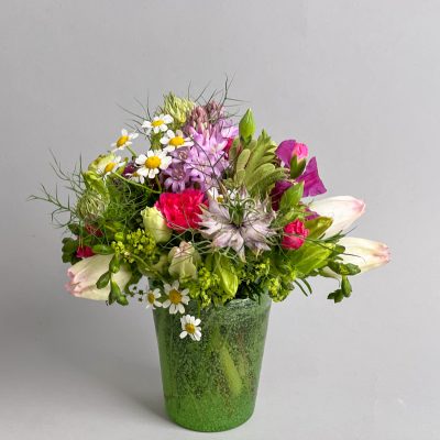 Colorful spring filling with glass vases